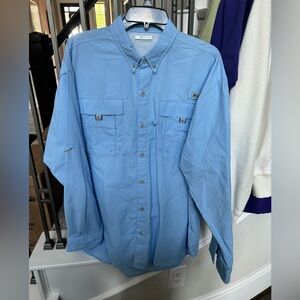 Brand New, never washed or worn. Columbia Blue fishing style shirt